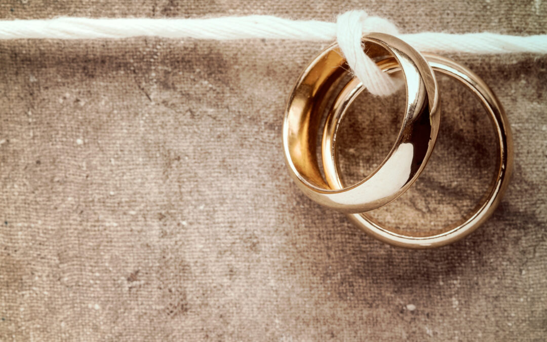 Picture of two wedding rings on a string
